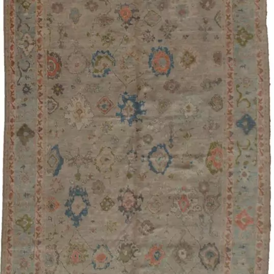 alt="Ushak carpet with taupe field and duck egg blue border" alt="Handwoven Ushak rug with Harchang floral design" alt="Modern production Ushak with antique finish and natural dyes" alt="Taupe and blue Persian-style rug with all-over floral motif"