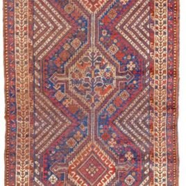 alt="Antique Khamseh runner with light blue ground and tribal motifs" alt="Persian tribal runner with birds, dogs, and medallions" alt="Rare Khamseh rug from South Iran with floral and animal motifs" alt="Vintage narrow Khamseh rug with central medallions on blue field"