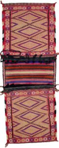 Vintage Kelat tribal bag with floral border Intact Khorjin bag from Northeast Iran Joyful colours on vintage Kelat weaving Fine weave detail of Kelat nomadic bag Decorative Persian tribal saddlebag