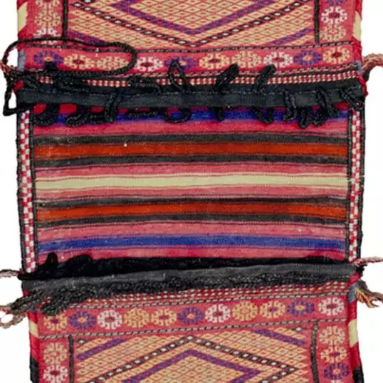 Vintage Kelat tribal bag with floral border Intact Khorjin bag from Northeast Iran Joyful colours on vintage Kelat weaving Fine weave detail of Kelat nomadic bag Decorative Persian tribal saddlebag