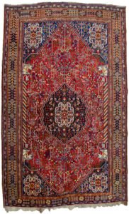 alt="Antique Qashqai rug with horse head columns and Hashgul medallion" alt="Tribal Persian rug with aged natural dyes and off-centre medallion" alt="Handwoven Qashqai rug with eight paisley design and vibrant colours" alt="South Iran tribal rug with Persepolis-inspired motifs"