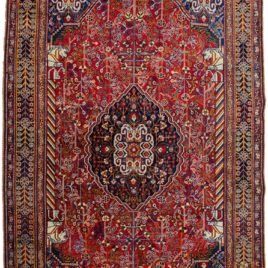 alt="Antique Qashqai rug with horse head columns and Hashgul medallion" alt="Tribal Persian rug with aged natural dyes and off-centre medallion" alt="Handwoven Qashqai rug with eight paisley design and vibrant colours" alt="South Iran tribal rug with Persepolis-inspired motifs"