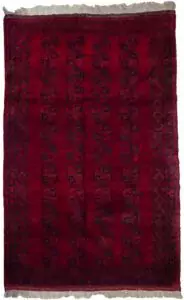 alt="Vintage Aktche Afghan carpet with elephant foot design on red ground" alt="Afghan wool rug with deep red background and tribal motifs" alt="Traditional Afghan carpet with long soft pile and geometric pattern" alt="Handwoven vintage Afghan rug in elephant foot motif"
