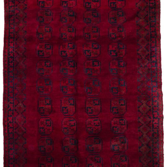 alt="Vintage Aktche Afghan carpet with elephant foot design on red ground" alt="Afghan wool rug with deep red background and tribal motifs" alt="Traditional Afghan carpet with long soft pile and geometric pattern" alt="Handwoven vintage Afghan rug in elephant foot motif"
