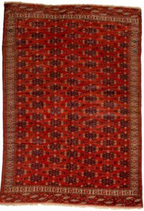 alt="Antique Yamoud Turkmen carpet dated 1899 with Kepse Gul design" alt="Rich red Turkmen rug with natural dyes and cream vine border" alt="Handwoven 19th-century Yamoud carpet with tribal motifs" alt="Fine antique Turkmen rug with all-over design and excellent condition"