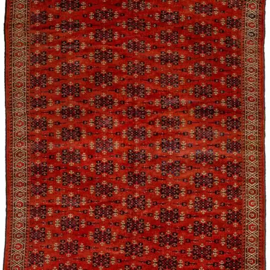 alt="Antique Yamoud Turkmen carpet dated 1899 with Kepse Gul design" alt="Rich red Turkmen rug with natural dyes and cream vine border" alt="Handwoven 19th-century Yamoud carpet with tribal motifs" alt="Fine antique Turkmen rug with all-over design and excellent condition"