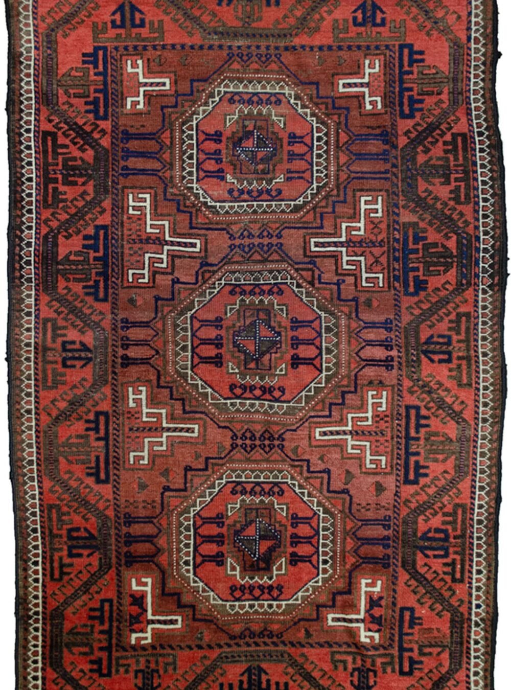 alt="Antique Baluch rug from Northeast Iran with terracotta ground and medallions" alt="Baluch tribal rug with eight-sided medallions and geometric border" alt="Vintage Persian Baluch carpet with maturing red hues and natural dyes" alt="Terracotta Baluch rug with traditional tribal motifs