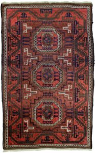 alt="Antique Baluch rug from Northeast Iran with terracotta ground and medallions" alt="Baluch tribal rug with eight-sided medallions and geometric border" alt="Vintage Persian Baluch carpet with maturing red hues and natural dyes" alt="Terracotta Baluch rug with traditional tribal motifs