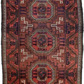alt="Antique Baluch rug from Northeast Iran with terracotta ground and medallions" alt="Baluch tribal rug with eight-sided medallions and geometric border" alt="Vintage Persian Baluch carpet with maturing red hues and natural dyes" alt="Terracotta Baluch rug with traditional tribal motifs