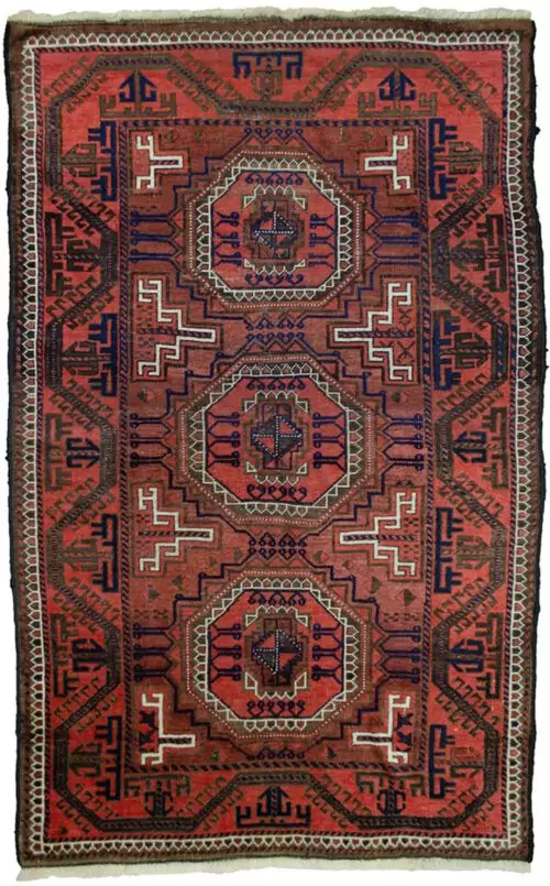 alt="Antique Baluch rug from Northeast Iran with terracotta ground and medallions" alt="Baluch tribal rug with eight-sided medallions and geometric border" alt="Vintage Persian Baluch carpet with maturing red hues and natural dyes" alt="Terracotta Baluch rug with traditional tribal motifs