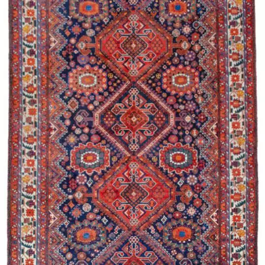 alt="Heinegoon Bakhtiyari rug with royal blue ground and five medallions" alt="Vintage Persian rug with paisley spandrels and cream border" alt="Rare design Heinegoon rug with natural dyes and handspun wool" alt="Collectible Bakhtiyari rug with tribal motifs and floral medallions"