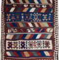 alt="Tribal kilim with bold central motifs and cream geometric border" alt="Handwoven wool kilim with multicoloured striped ends" alt="Decorative tribal kilim with traditional patterns and colourful finish" alt="Flatweave kilim with tribal design and balanced layout"