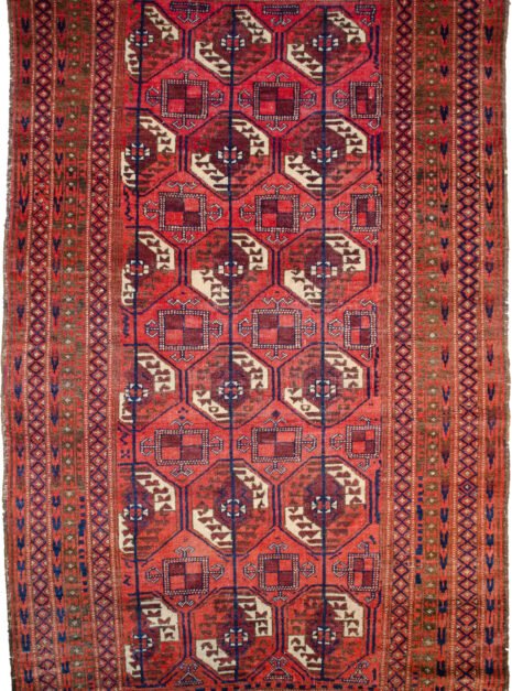 H111-Turkman-217x130cm.jpg alt="Vintage Turkmen rug with octagonal guls and ram’s horn motifs" alt="Tribal rug with olive green borders and geometric field design" alt="Three-row Turkmen carpet with symbolic motifs and earthy tones" alt="Handwoven Turkmen rug in good vintage condition with soft colours"