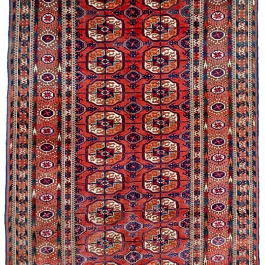 “Antique Tekke Turkmen rug with elephant foot guls and geometric borders” “Central Asian tribal rug with lozenge end motifs and red field” “Handwoven Tekke carpet featuring traditional tribal guls and borders” “Decorative antique Turkmen rug with classic Tekke design”