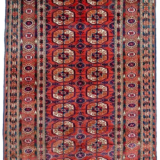 “Antique Tekke Turkmen rug with elephant foot guls and geometric borders” “Central Asian tribal rug with lozenge end motifs and red field” “Handwoven Tekke carpet featuring traditional tribal guls and borders” “Decorative antique Turkmen rug with classic Tekke design”