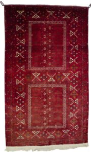 “Vintage Afghan Pardeh rug with original hanging loops” “Red tribal Afghan rug from Kunduz used as tent curtain” “Pardeh design curtain rug with fine weave from Afghanistan” “Afghan handwoven curtain rug with deep red wool”