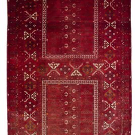 “Vintage Afghan Pardeh rug with original hanging loops” “Red tribal Afghan rug from Kunduz used as tent curtain” “Pardeh design curtain rug with fine weave from Afghanistan” “Afghan handwoven curtain rug with deep red wool”