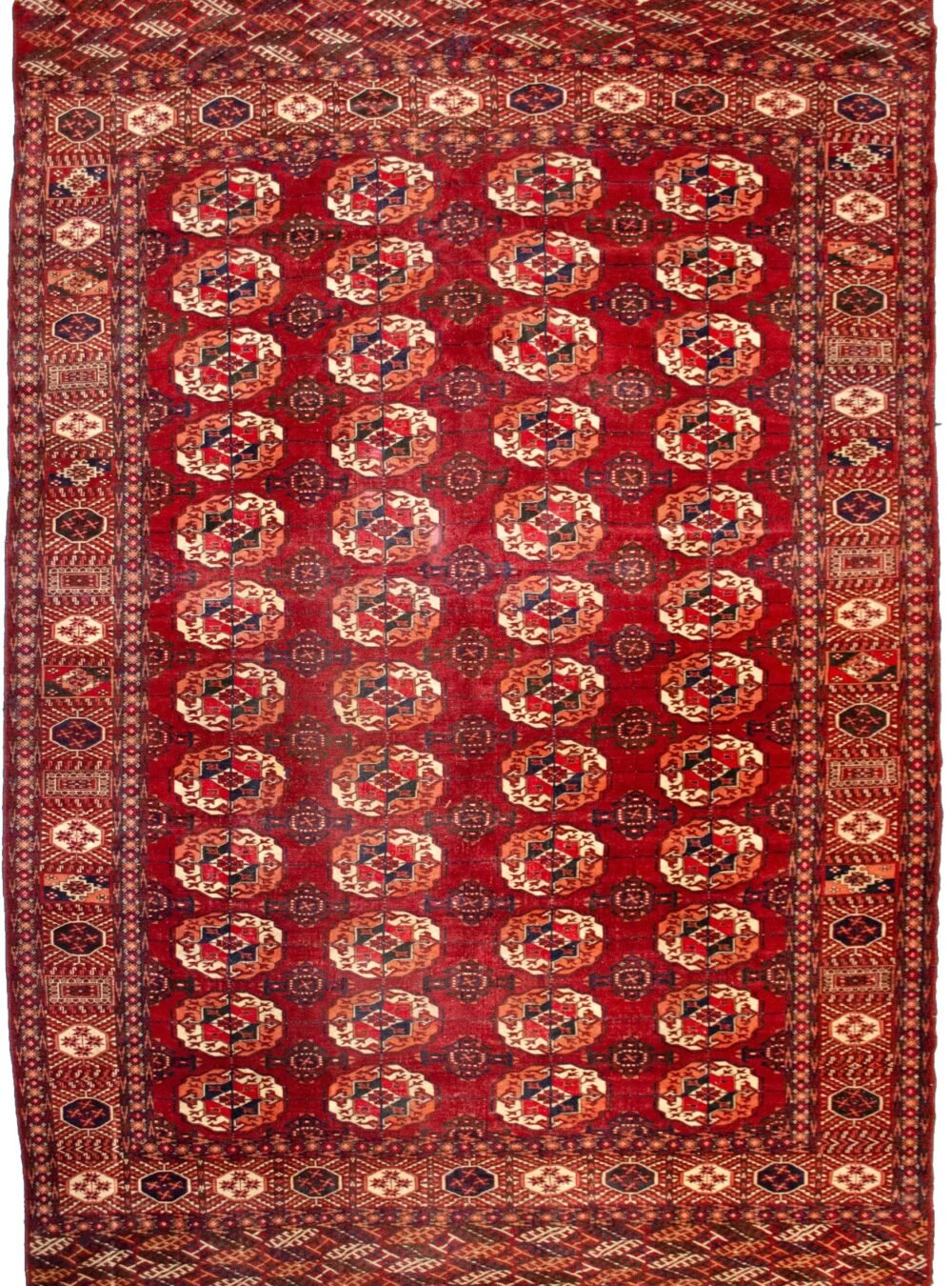 alt="Antique Turkmen carpet with four rows of Salor Guls" alt="Deep red tribal rug with classic Turkmen border" alt="Soft wool Turkmen rug with sheen and traditional motifs" alt="Vintage Central Asian rug ideal for dining room"