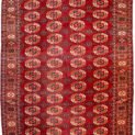 alt="Antique Turkmen carpet with four rows of Salor Guls" alt="Deep red tribal rug with classic Turkmen border" alt="Soft wool Turkmen rug with sheen and traditional motifs" alt="Vintage Central Asian rug ideal for dining room"