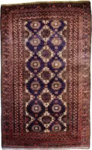 alt="Vintage Baluch rug with blue field and lozenge guls" alt="Persian tribal rug with ram’s horn motif and rose borders" alt="Handwoven Baluch rug with kilim ends and geometric design" alt="Eastern Iran vintage rug with symbolic lozenge and guls"
