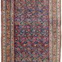 “Antique Bijar runner with blue field and apricot floral border” “Handwoven Persian rug with low pile and wool foundation” “Elegant narrow Bijar rug for hallway or corridor” “Densely woven antique Bijar runner from West Iran”