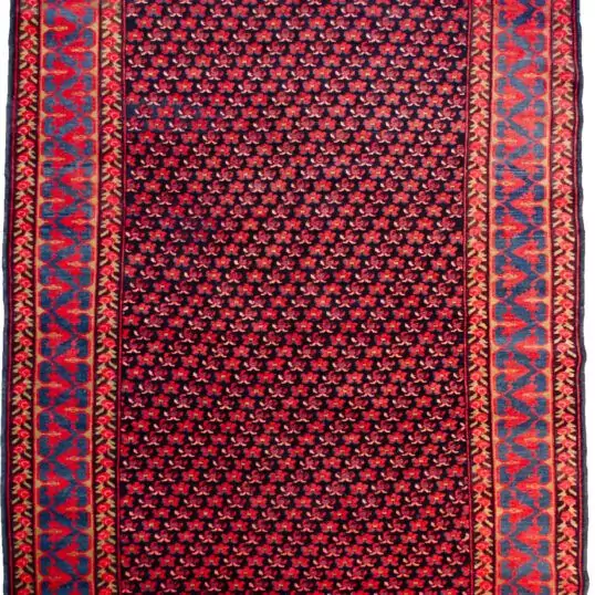 alt="Vintage Karabagh rug with dark blue field and small floral motifs" alt="Caucasian rug with light blue leaf border and colour variation" alt="Handwoven Karabagh rug with flower guard border" alt="Elegant blue Karabagh carpet with traditional floral design"