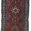 “Antique Heriz runner with deep red field and medallions” “Northwest Persian Heriz carpet with cream geometric border” “Hand-knotted antique runner with traditional Heriz design” “Vintage Heriz hallway rug from Iran with natural dye colours”