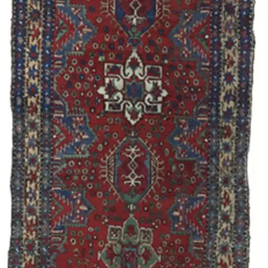 “Antique Heriz runner with deep red field and medallions” “Northwest Persian Heriz carpet with cream geometric border” “Hand-knotted antique runner with traditional Heriz design” “Vintage Heriz hallway rug from Iran with natural dye colours”