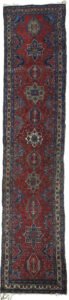 “Antique Heriz runner with deep red field and medallions” “Northwest Persian Heriz carpet with cream geometric border” “Hand-knotted antique runner with traditional Heriz design” “Vintage Heriz hallway rug from Iran with natural dye colours”