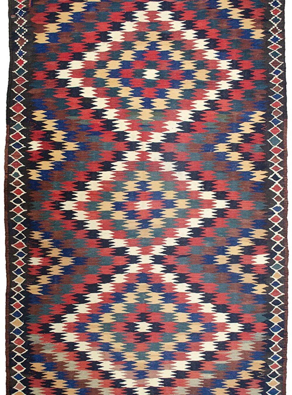 alt="Antique Varamin kilim rug with eye dazzler design from Central Iran" alt="Room-size Persian kilim with geometric lozenge border and tribal motif" alt="Rare Varamin kilim with weaver's mark and traditional flatweave" alt="Collectible Persian flatweave rug in earthy tones with bold design"