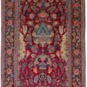 alt="Antique Kashan rug with pictorial building and niche design" alt="Persian rug with rose garland and floral border from Kashan" alt="Kashan rug with birds, roses, and chrysanthemums in border" alt="Collector's antique Persian rug from central Iran"