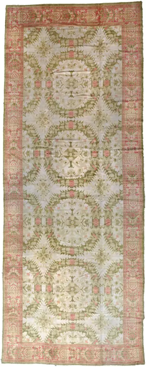 alt="Antique Alcaraz carpet with cream and green all-over design and pink border" alt="Early 20th-century Spanish rug from Alcaraz region" alt="Muted antique Spanish carpet with Moorish influence and natural ageing" alt="Historic Alcaraz rug with subtle tones and rare design"