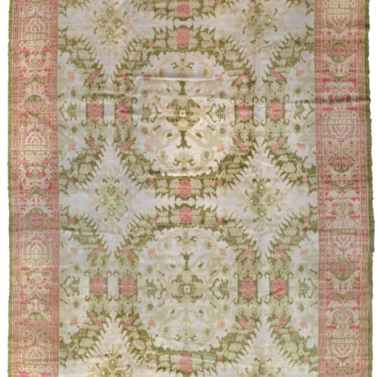 alt="Antique Alcaraz carpet with cream and green all-over design and pink border" alt="Early 20th-century Spanish rug from Alcaraz region" alt="Muted antique Spanish carpet with Moorish influence and natural ageing" alt="Historic Alcaraz rug with subtle tones and rare design"