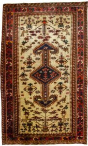 alt="Nasrabad rug with double anchor medallion on cream ground" alt="Tribal Persian rug with stylized peacocks and deer" alt="Durable Nasrabad carpet with multicoloured S design borders" alt="Persian rug with floral and animal motifs on neutral background"