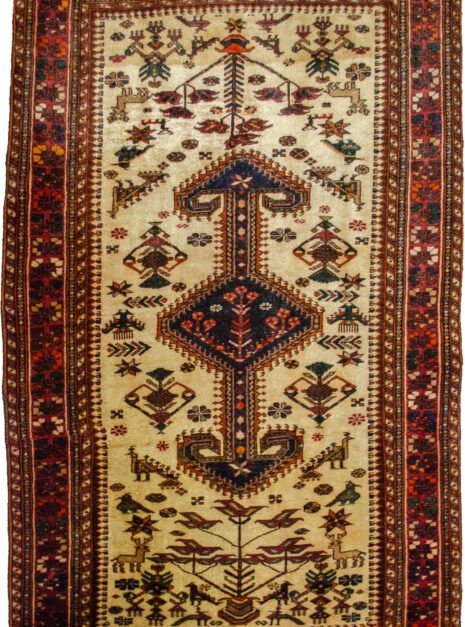M347-Nasrabad-155x97cm.jpg alt="Nasrabad rug with double anchor medallion on cream ground" alt="Tribal Persian rug with stylized peacocks and deer" alt="Durable Nasrabad carpet with multicoloured S design borders" alt="Persian rug with floral and animal motifs on neutral background"