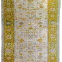 alt="Rare antique Ziegler Sultanabad carpet with olive green border" alt="Large cream-ground Persian rug with all-over floral design" alt="Decorative antique Sultanabad rug with light blue and peach accents" alt="Age-worn Ziegler carpet from Central Iran with Western market size"