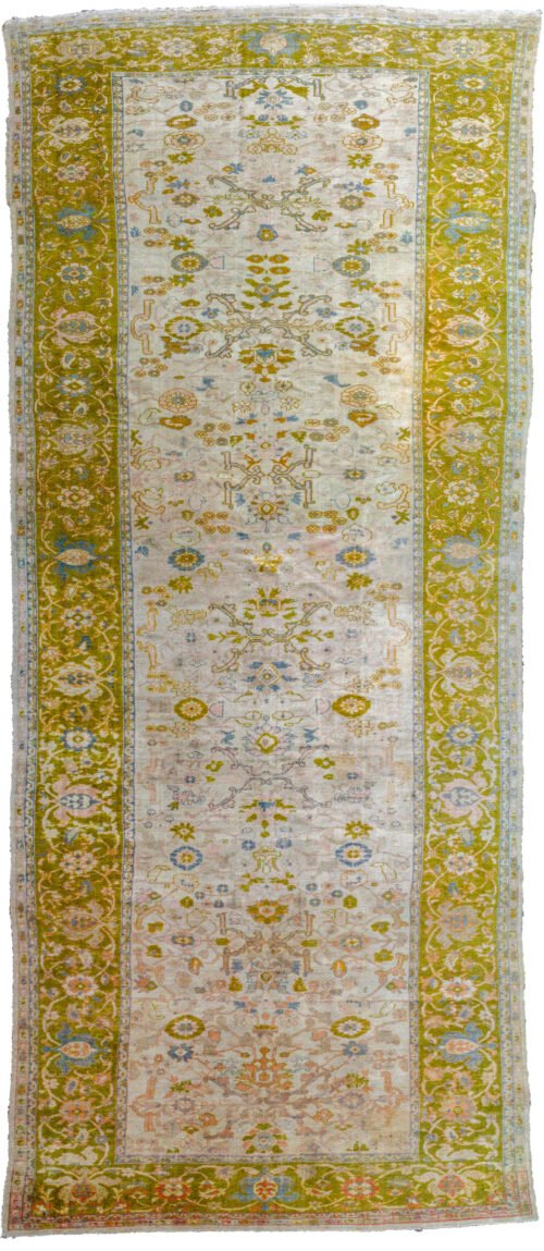 alt="Rare antique Ziegler Sultanabad carpet with olive green border" alt="Large cream-ground Persian rug with all-over floral design" alt="Decorative antique Sultanabad rug with light blue and peach accents" alt="Age-worn Ziegler carpet from Central Iran with Western market size"