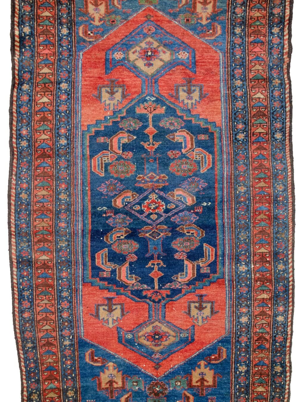 alt="Antique Zanjan rug with deep red hue and bold design" alt="Persian tribal rug with geometric motifs from Northwest Iran" alt="Vintage handspun wool rug with natural sheen" alt="Zanjan rug with strong character and rich colours"