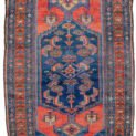 alt="Antique Zanjan rug with deep red hue and bold design" alt="Persian tribal rug with geometric motifs from Northwest Iran" alt="Vintage handspun wool rug with natural sheen" alt="Zanjan rug with strong character and rich colours"