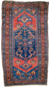 alt="Antique Zanjan rug with deep red hue and bold design" alt="Persian tribal rug with geometric motifs from Northwest Iran" alt="Vintage handspun wool rug with natural sheen" alt="Zanjan rug with strong character and rich colours"