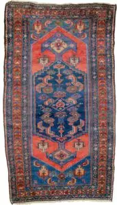 alt="Antique Zanjan rug with deep red hue and bold design" alt="Persian tribal rug with geometric motifs from Northwest Iran" alt="Vintage handspun wool rug with natural sheen" alt="Zanjan rug with strong character and rich colours"
