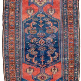 alt="Antique Zanjan rug with deep red hue and bold design" alt="Persian tribal rug with geometric motifs from Northwest Iran" alt="Vintage handspun wool rug with natural sheen" alt="Zanjan rug with strong character and rich colours"