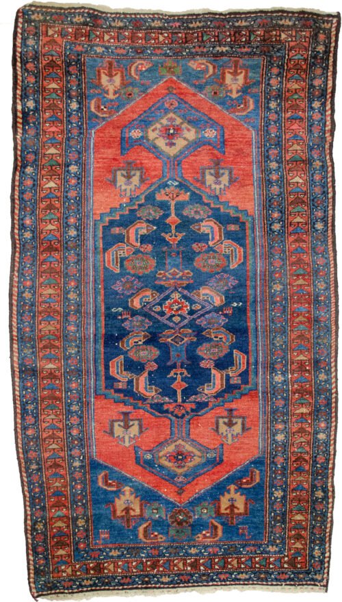 alt="Antique Zanjan rug with deep red hue and bold design" alt="Persian tribal rug with geometric motifs from Northwest Iran" alt="Vintage handspun wool rug with natural sheen" alt="Zanjan rug with strong character and rich colours"
