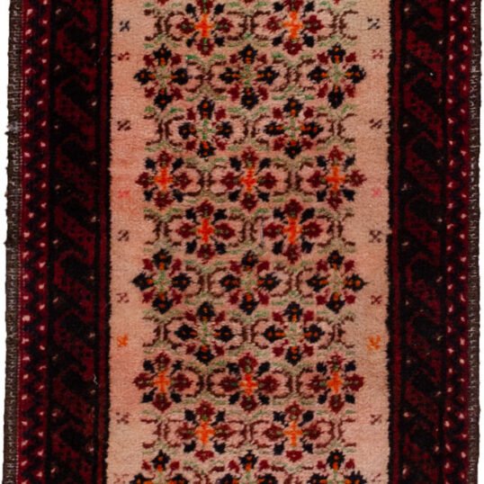alt="Narrow Baluch runner with light pink floral field" alt="Vintage hallway runner with stylised flowers and red borders" alt="Slim Baluch tribal rug with pink ground and geometric edges" alt="Rare format Persian runner for narrow hallway space"