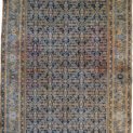 alt="Antique Cheshme rug with blue Herati design and rose border" alt="Persian Farahan rug with subtle abrash and geometric pattern" alt="Low-pile antique rug from Iran with classic Herati motif" alt="Elegant vintage Persian rug with blue field and rose-toned border"