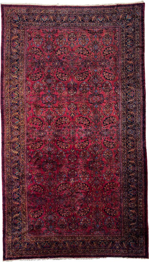 alt="Large Lilihan carpet with deep red field and blue floral border" alt="Rare oversized Persian rug with all-over bush design" alt="Naturally dyed Lilihan rug with soft wool and excellent pile" alt="Traditional Persian carpet in red and blue with floral motifs"