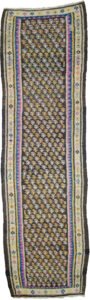 alt="Narrow Harsin kilim runner with stylised bush motifs" alt="Grey-brown Persian kilim with cream border from West Iran" alt="Kurdish kilim runner with tribal motifs and natural dyes" alt="Handwoven Harsin runner professionally reduced in length"