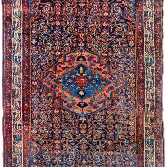 alt="Antique Tajabad rug with navy blue ground and peach medallion" alt="Persian village rug with cream border and natural dye sheen" alt="High-quality wool Tajabad rug with traditional design" alt="Vintage Persian carpet with rich colours and soft luster"