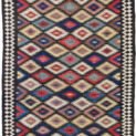 This rare and beautifully woven Saveh kilim is a testament to the exceptional quality and artistry that emerges from even the lesser-known weaving regions of Iran. While the city of Saveh and its surrounding villages are not major kilim production centres, the pieces that do originate from there are often outstanding in both design and craftsmanship—and this example is no exception. The kilim features a dazzling all-over lozenge design, bold and rhythmic, creating visual energy that draws the eye and enlivens any space. The field is framed by a soft cream border, which not only softens the dynamic central pattern but also elevates the overall composition with elegance and balance. Woven using traditional flatweave techniques and naturally dyed wool, this piece is lightweight yet durable, and easy to use in various interior settings—from rustic and eclectic to contemporary and minimalist. Kilims like this are often underrated, yet they represent a sophisticated blend of utility, tradition, and decorative appeal. This piece, in particular, stands out as an engaging and collectible work of woven art. ✅ Key Features: Origin: Saveh, Iran Type: Kilim (flatweave) Design: Dazzling lozenge pattern Border: Cream, with geometric motifs Material: Wool Dye: Natural vegetable dyes Condition: Excellent Size: (Insert dimensions if available) Use: Wall hanging, floor rug, layering textile, collector’s item ✅ Why This Kilim? Rare in origin and rich in style, this Saveh kilim brings colour, movement, and authentic craftsmanship to any interior—a true decorative gem. ✅ Call to Action Celebrate the art of flatweave with this vibrant Saveh kilim—a stylish and distinctive piece woven with heritage and flair.