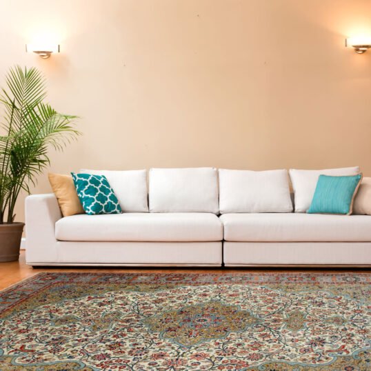 Antique Persian rug in a neutral London living room with mid-century decor